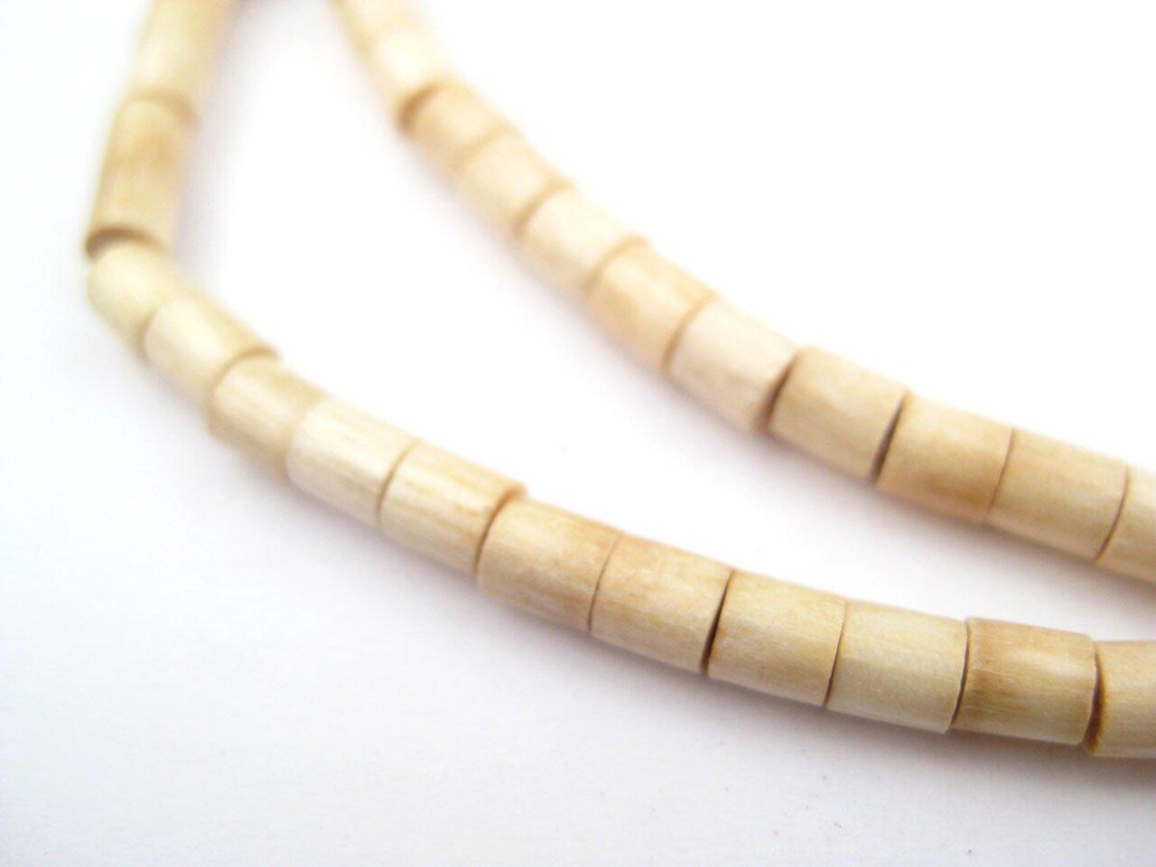 The Bead Chest Beige Cylindrical Wood Beads 4mm Brown Cylinder 16 Inch Strand